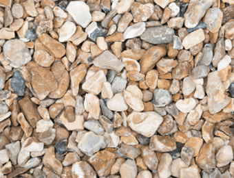 Shingle, a natural flint aggregate, graded from 10mm to 20mm, displayed loose.