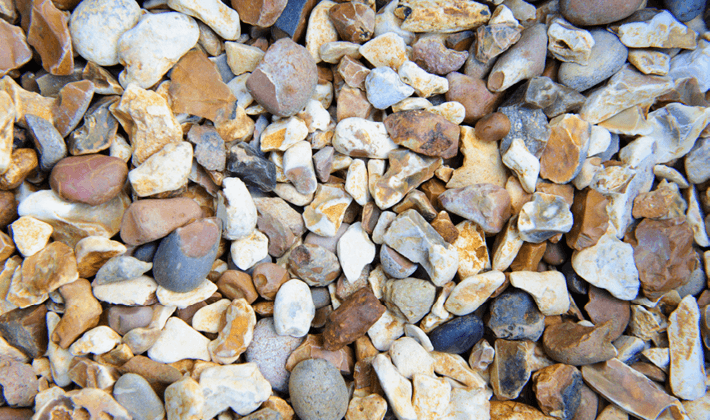 Golden shingle, displayed dry, containing golden, brown and white flints, graded from 10 to 20mm.