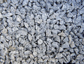 Silver grey chippings, graded from 6mm to 14mm, containing black, silver and quartz chippings, displayed loose.