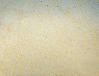 Play/leisure sand, pale in colour, displayed loose.